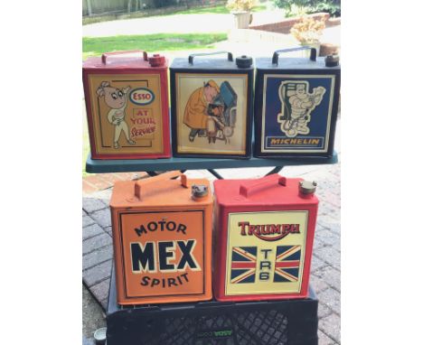 A collection of five Vintage hand painted Petroleum cans Motor Mex Spirit Triumph TR6 Michelin Esso and one other (5)