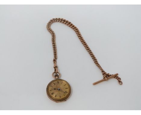 A 9ct hollow gold albert chain and rose gold fob watch. Chain links graduate in size and each one is marked 9ct. Chain makers