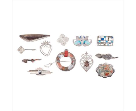 A collection of various brooches to include various agate set brooches and an agate set kilt pin, luckenbooth brooches; ename
