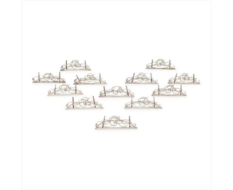 A set of twelve menu holders George Edward &amp; Sons, Glasgow 1904, each of scrolling from and an applied italic R to centre