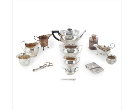 A collection of silver to include; a three piece bachelor's tea service, EH, London 1898, of small size, demi ribbed and cast