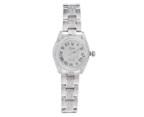 A lady's stainless-steel and diamond wrist watch, Rolex Datejust, diamond set bezel and face with black Roman numerals, date 