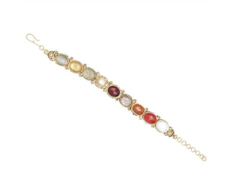 Y An Indian Navaratna gem-set bracelet rub-over set with nine different gems including mother-of-pearl, coral and a diamond c