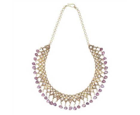 An Indian spinel and diamond set necklace the lattice set with table and rose-cut diamonds, with mixed-cut spinel drops depen