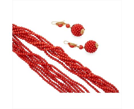 Y A multi-strand coral necklace composed of eight strands of coral beads, to an unmarked yellow metal stylised bow clasp; tog