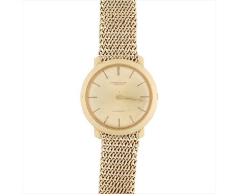 A lady's 18ct gold wrist watch, IWC gold coloured dial, baton indicators, integral flexible 18ct gold bracelet, fold over cla