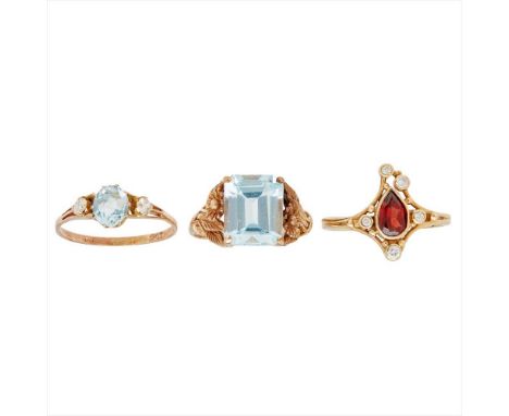 A collection of gem set rings to include an 9ct gold aquamarine set ring, floral detail to shoulders; an aquamarine and diamo