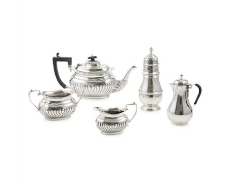 A matched bachelor's three piece tea service Birmingham, comprising teapot, twin handled sugar basin and milk jug, of oval de