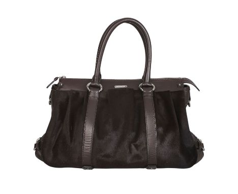   CELINE Henkeltasche.   NP. ca.: 2.100,-€. Dunkelbraunes Glattleder, dunkelbraunes Ponyfell, silberfarbne Hardware, Doppelhe