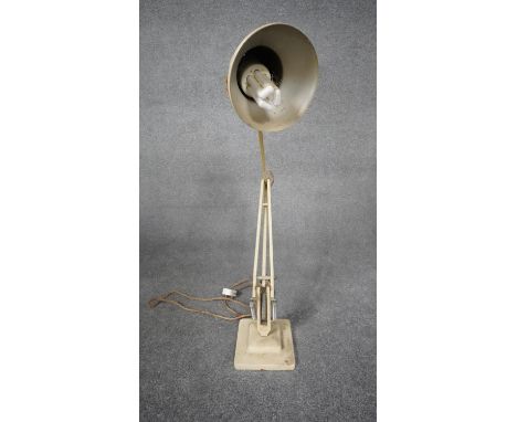 A vintage Herbert Terry Anglepoise cream enamel on metal table lamp, makers stamp.H.72 