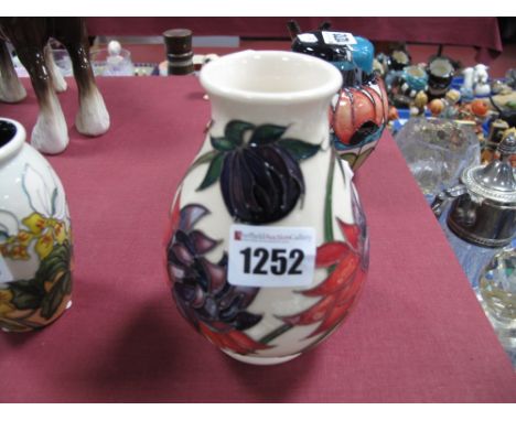 A Moorcroft Pottery Vase, decorated with the Ruby Red design by Emma Bossons, shape 7/5, impressed and painted marks, 13cm hi