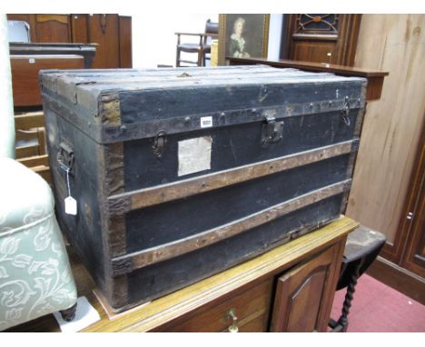A Metal Bound Hessian Covered Travelling Trunk.