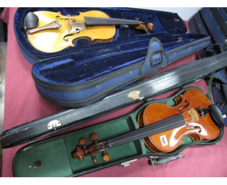 German Violin, (cased) with label "Manufactured in Dresden Imitation of Antonio Stradivarius"; together with another violin (