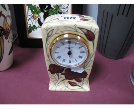 A Moorcroft Pottery Clock, decorated with the Chocolate Cosmos design by Rachel Bishop, shape CL1, impressed and painted mark
