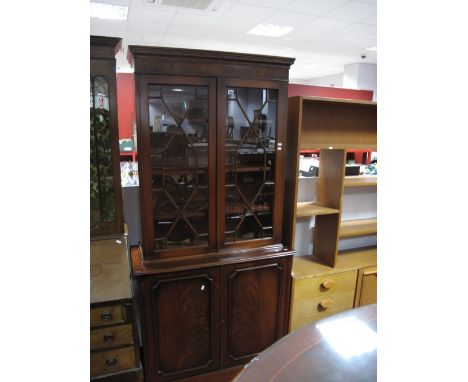 Late XX Century Book Cabinet With Dental Cornice, astral upper doors and paneled cupboard doors.