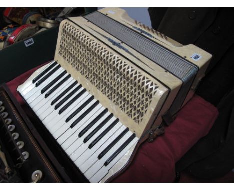 A Hohner Carmen II Accordion, with leather straps (no case).