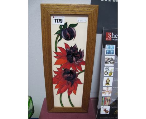 A Moorcroft Pottery Plaque, decorated with the Ruby Red design by Emma Bossons, 29 x 9.5cm, framed.