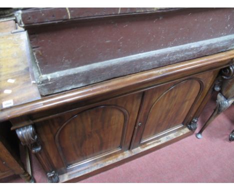 A XIX Century Mahogany Cabinet, with moulded edge, two panelled cupboard doors, on plinth base.