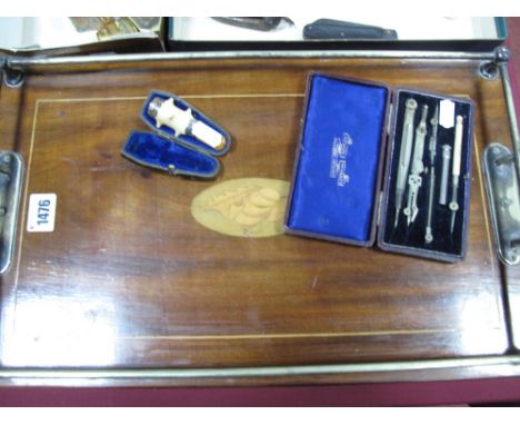 An Edwardian Mahogany Tray, electroplated twin handles and gallery with boxwood stringing and inlaid shell oval, a cased cher