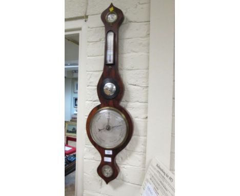 A 1830s mahogany 'onion topped' five function mercurial barometer/thermometer, with convex mirror, hydrometer and level, 96 c