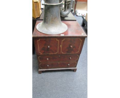 An early 19th century scrumbled pine chest commode with ceramic liner