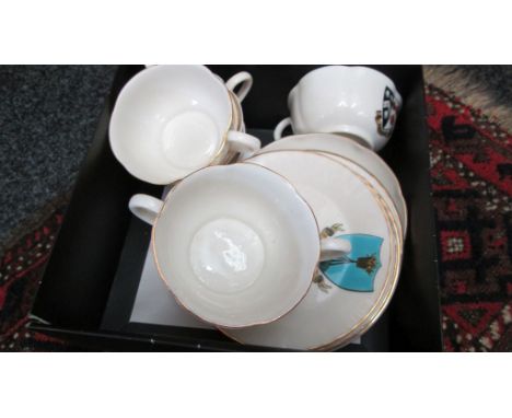 Four W. H. Goss tea cups and saucers, decorated with the arms of Cheddar, Bromsgrove, Pembroke and Southton, together with si