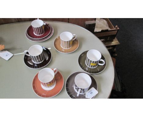 A set of six Susie Cooper coffee cups and saucers