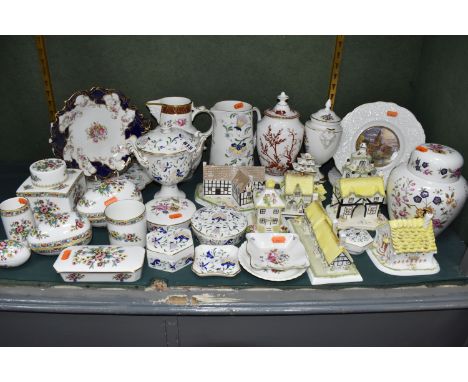 A COLLECTION OF COALPORT PORCELAIN, over thirty pieces, to include 'The Caughley Mask-Head Jug', a covered vase in the Indian