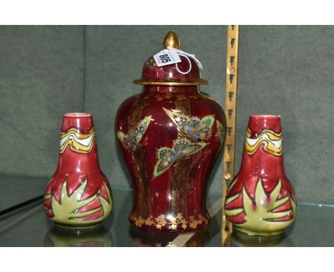 A FIELDINGS CROWN DEVON COVERED VASE AND A PAIR OF MINTON VASES, a Fieldings Crown Devon covered vase, of baluster form, deco