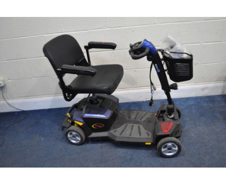 AN APEX RAPID MOBILITY SCOOTER with one key, charger and spare decor panels (PAT pass and working)