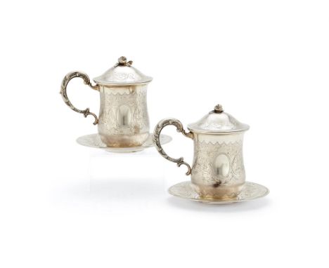 A pair of German silver coloured sahlep cups, covers and saucers for the Ottoman market by Lutz & Weiss, Pforzheim, post 1876