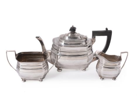 A silver shaped oblong baluster tea set by S. Blanckensee & Son Ltd., Chester 1929, the tea pot with composition finial and h