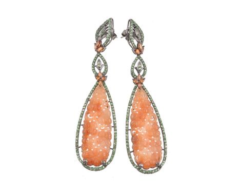 A pair of orange jadeite, green garnet and citrine pendant earrings by Bochic, New York, the tapering carved orange jadeite p