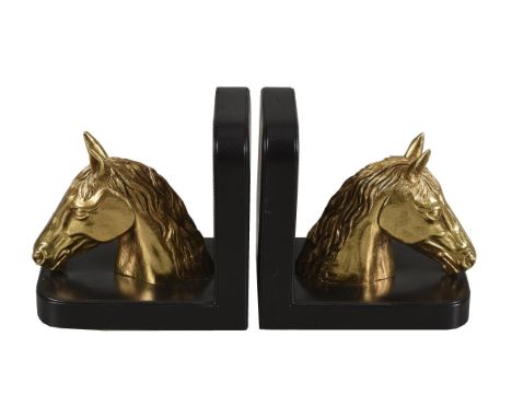 Asprey, a pair of black leather bookends, mounted with gilt metal horse heads, 15.5cm high, with an Asprey card boxCondition 