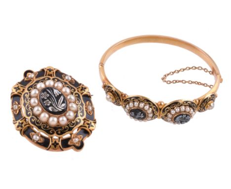 A 19th century hardstone, pearl and enamel bangle, circa 1880, the two central panels with oval hardstones carved with forget