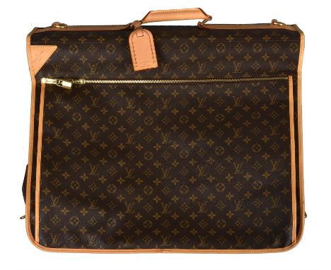 Louis Vuitton, a monogrammed canvas suit carrier, with a leather loop handle and gilt metal hardware, three zipped pockets, a