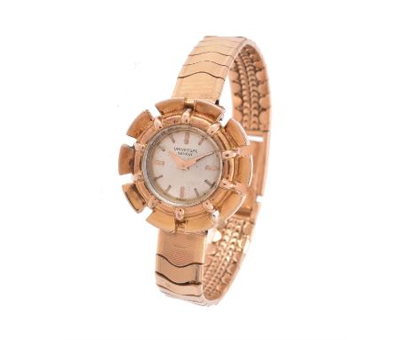 Universal, Lady's gold coloured bracelet watch, no. 1768402Movement: Cal. 500, manual wind, 17 jewels Case: Gold coloured cas