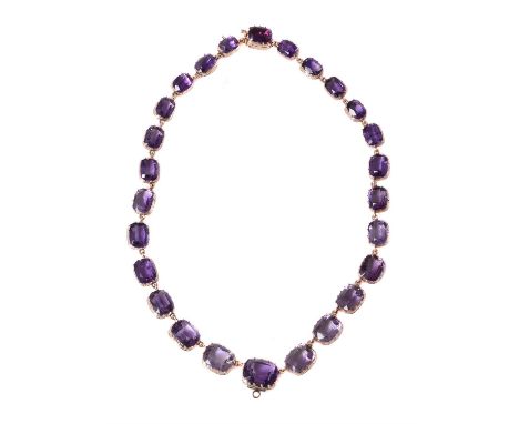 A mid-Victorian amethyst rivière necklace, circa 1870, the graduating cushion shaped amethysts in pinched collet settings, 38