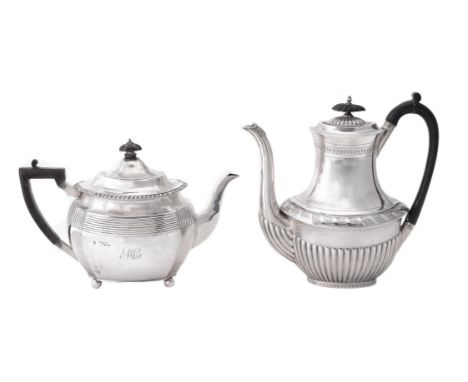 A Victorian silver shaped oblong baluster teapot by Charles Stuart Harris, London 1892, with a composition finial and harp ha