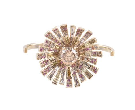 A coloured diamond, diamond and gem set dress ring by Bochic, New York, the central brilliant cut champagne coloured diamond 