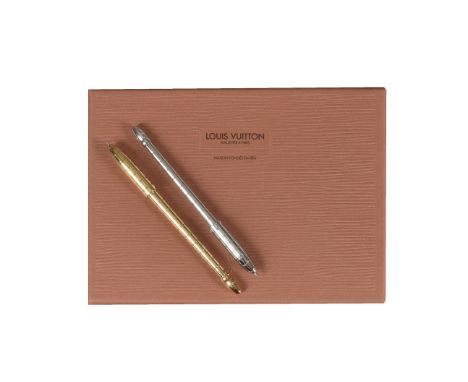 Louis Vuitton, a gold plated and leather ball point pen, the engine turned cap with a clip, with a Louis Vuitton box; Louis V