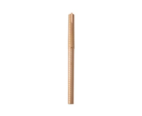 S. T. Dupont, a gold plated roller ball pen, the cap with a clip, with a S. T. Dupont box and two refills Condition Report: A