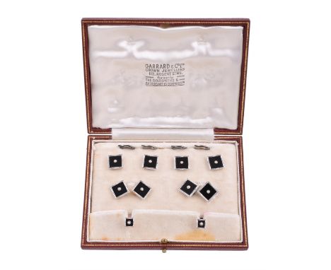 An Art Deco onyx and pearl dress set, circa 1930, the double sided cufflinks with square onyx panels set with half pearls, st
