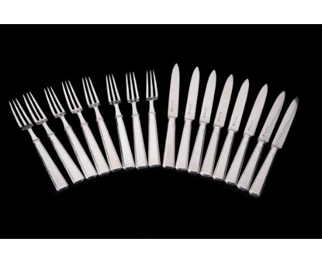 A set of eight Art Deco silver fruit knives and forks by The Goldsmiths & Silversmiths Co. Ltd, London 1935, Reg. no. 798068,