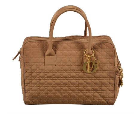 Christian Dior, Boston, a brown quilted Cannage polyester handbag, with twin loop handles, a zipped side pocket and yellow me