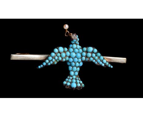 A mid 19th century turquoise, ruby, diamond and pearl St Esprit brooch, circa 1860, set with cabochon turquoise, the head set