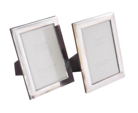 Two silver mounted rectangular photo frames by Carr's of Sheffield Ltd., Sheffield 2004 and 2005, with engine turned borders 