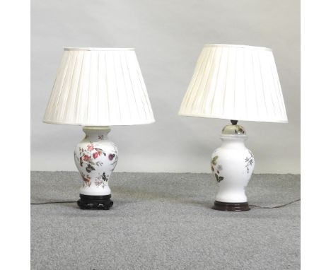 A porcelain table lamp and shade decorated with birds and flowers, 64cm high overall, together with another