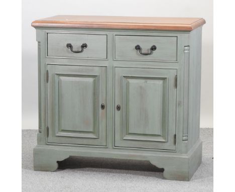 A modern green painted pine cabinet, on bracket feet, 97cm