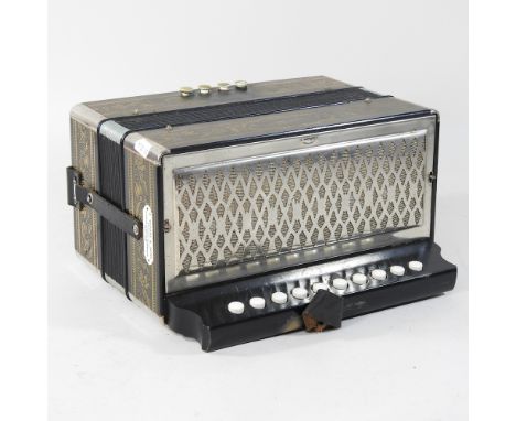 A Hohner Vienna 1140 accordion, bearing a label for E Woods &amp; son, Norwich, 29cm